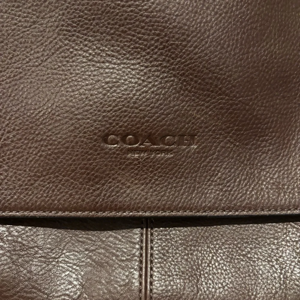 Coach pebbled leather messenger bag